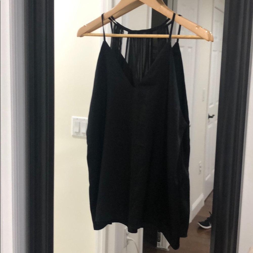 Sleeveless shirt, size medium